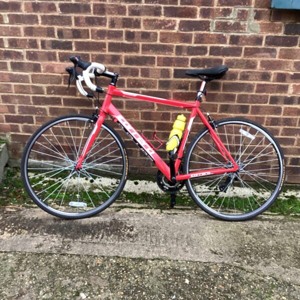 Red Carrera Zelos racing bike, ideal for road cycling and fitness.