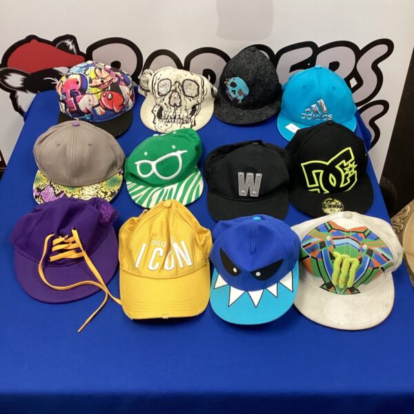 Collection of DC and Icon baseball caps, pre-owned headwear.