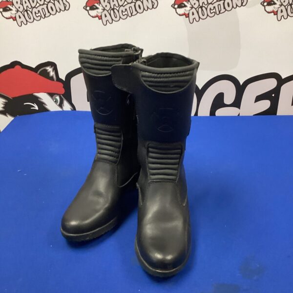 Size 5 Oxford motorcycle boots for riders, showing wear.