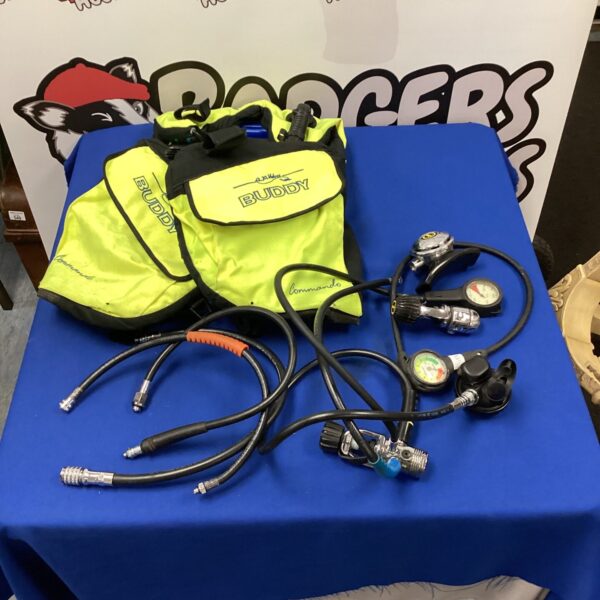 Yellow A.P. Valves scuba diving jacket with attached equipment.