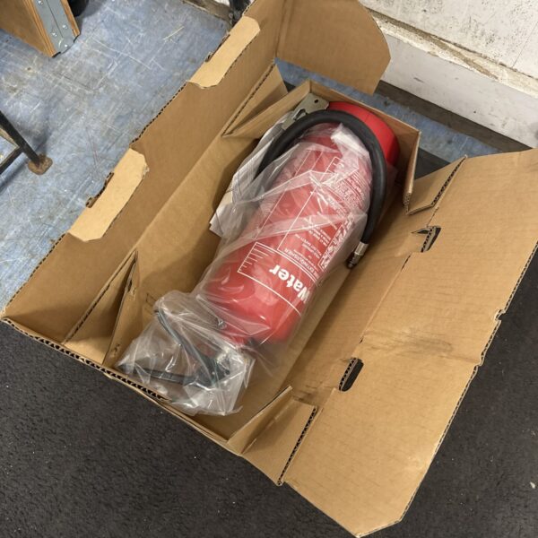 Vintage red water fire extinguisher for fire safety.