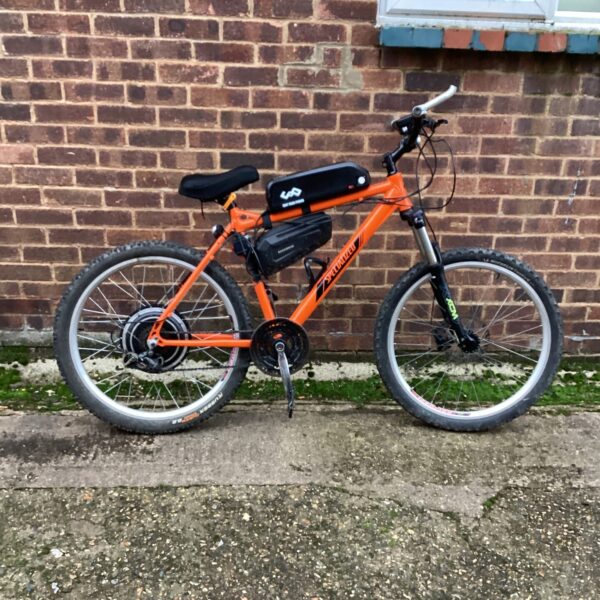 Orange Specialized Rockboss electric mountain bike for sale.