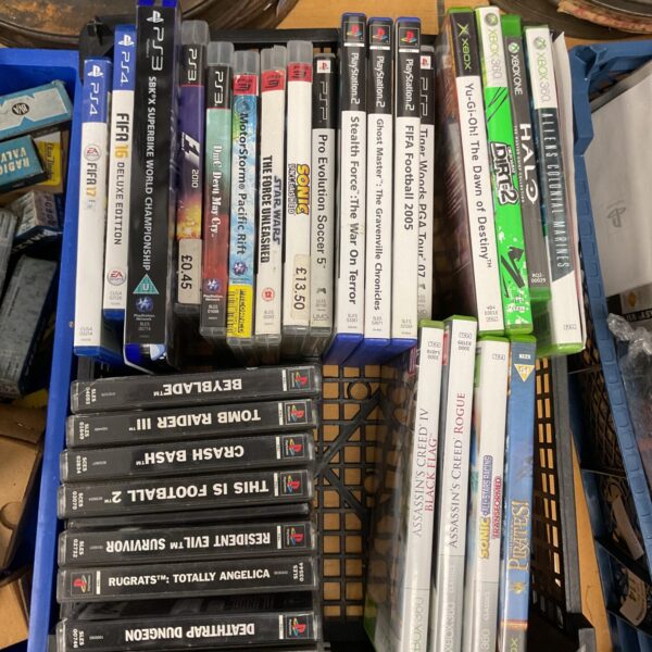Collection of PlayStation and Xbox video games for retro gaming.
