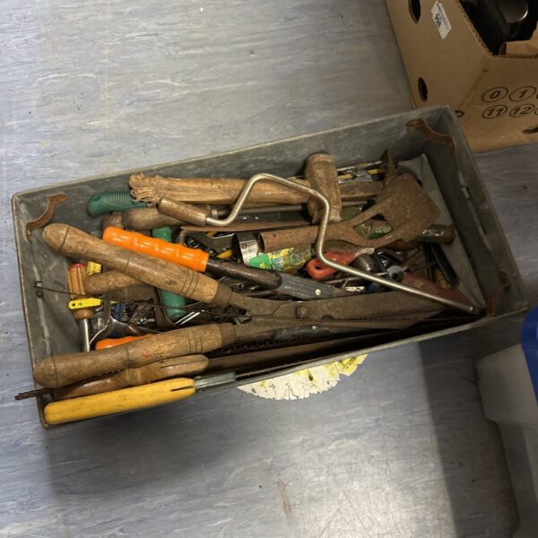 Galvanised tray filled with assorted vintage hand tools.