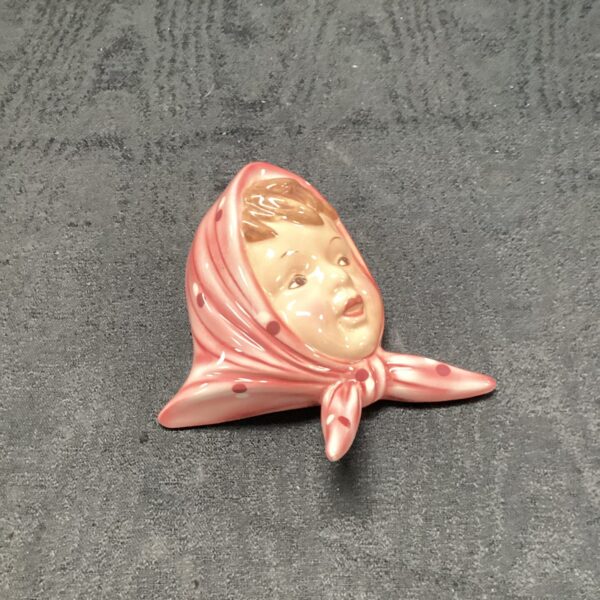 Vintage Australian ceramic lady plaque with polka dot scarf.