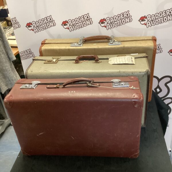 Brown vintage Revelation suitcase, classic travel luggage.