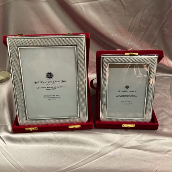 Vintage 999 silver picture frames set, elegant silver decor.