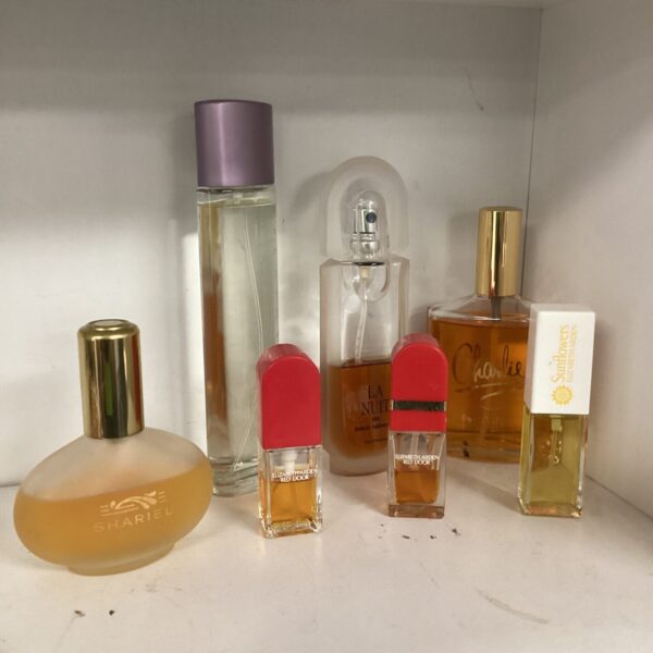 Vintage ladies perfume lot featuring La Nuit and Charlie fragrances.