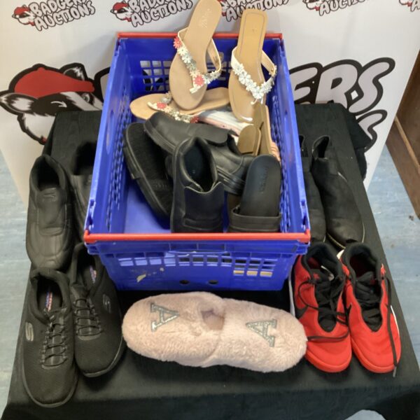 Blue crate filled with a mixed lot of branded trainers and shoes.
