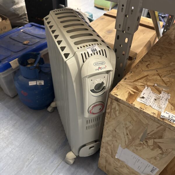White Delonghi Dragon3 portable heater for vintage home heating.