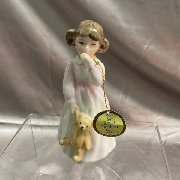 Royal Doulton "Daddy's Girl" figurine, a charming porcelain collectible.