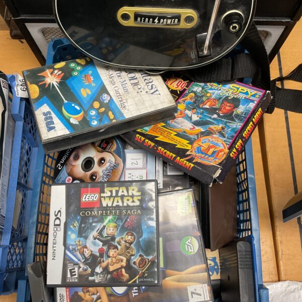 Retro video game collection including Nintendo DS, Sega Megadrive and Atari ST games.