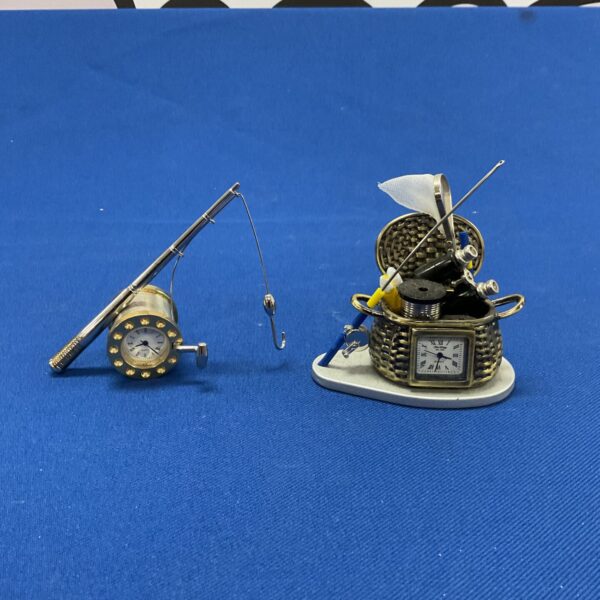 Vintage fishing rod mantle clock, unique collectible timepiece.