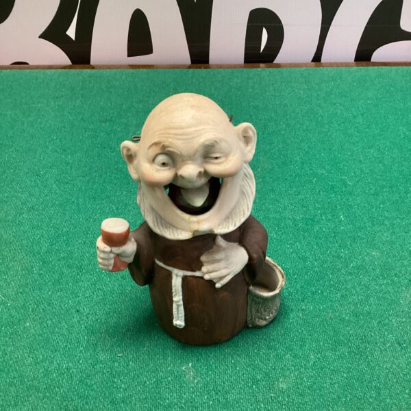 Vintage pottery nodding monk figurine, collectible ceramic ornament.