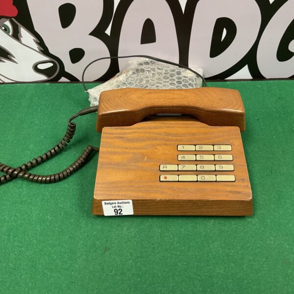 Vintage G Feller Trub wooden telephone with rotary dial.