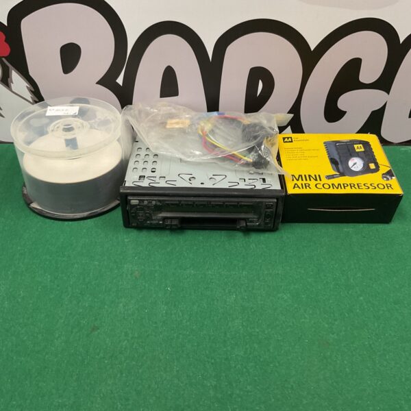 Vintage Kenwood car stereo head unit for classic car audio.