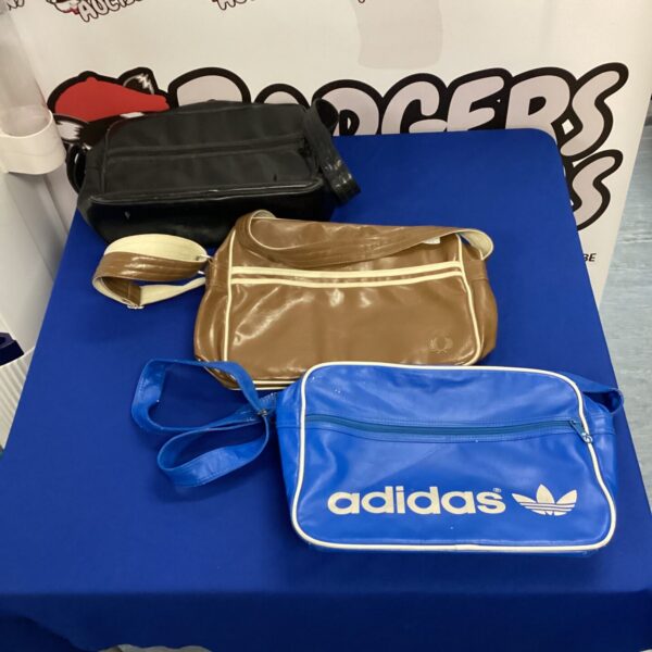 Front view of a vintage Adidas sports bag.