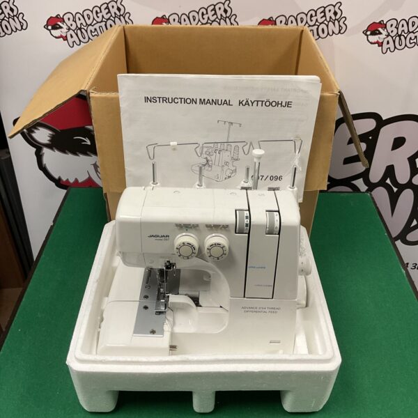 Vintage Jaguar Epochlock overlocker sewing machine with manual.