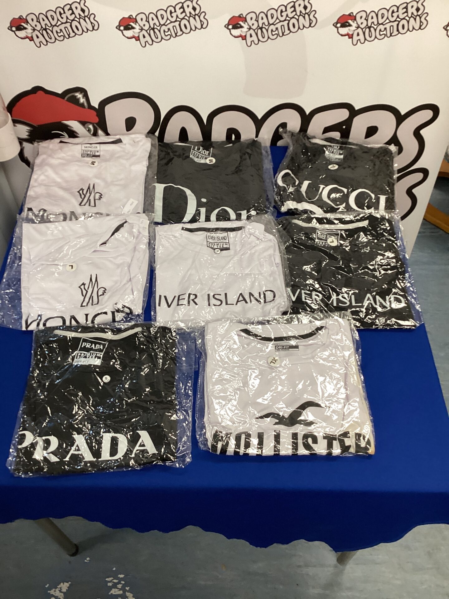 639 Eight designer style T-Shirts sizes small to XL