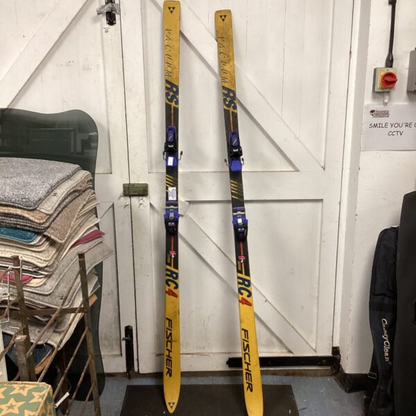 Pair of Fischer RC4 skis in vibrant colours.