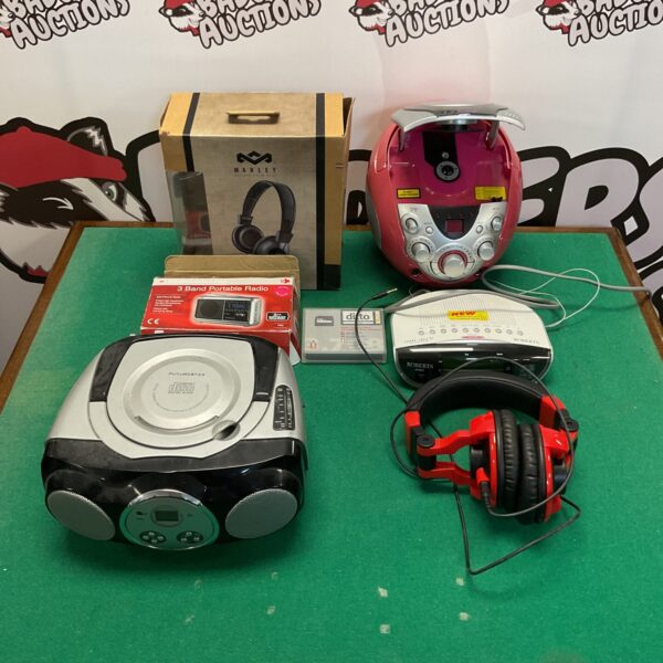 Mixed lot of vintage portable CD player, radio, and headphones.