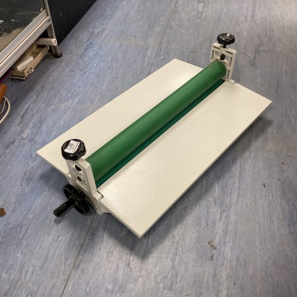Vintage cold press roller for laminating and printing applications.