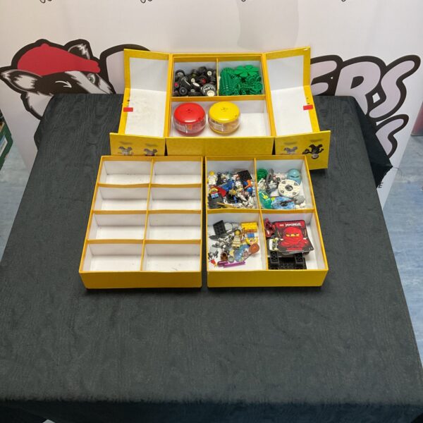 Lego storage box filled with assorted Lego parts and building blocks.