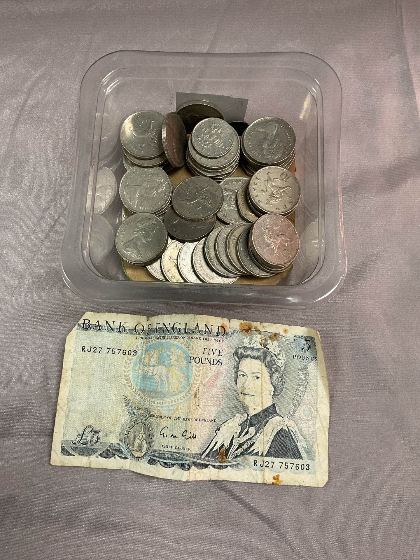 801 Tub of mixed coins and £5 Note
