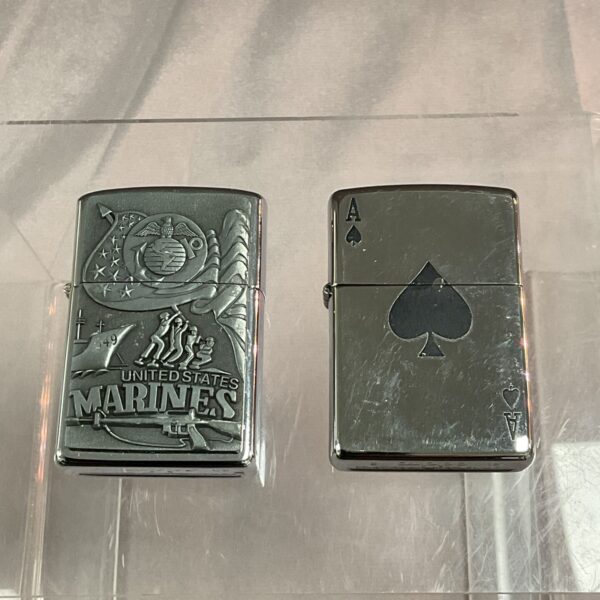 Vintage US Marines Zippo lighter with embossed emblem.