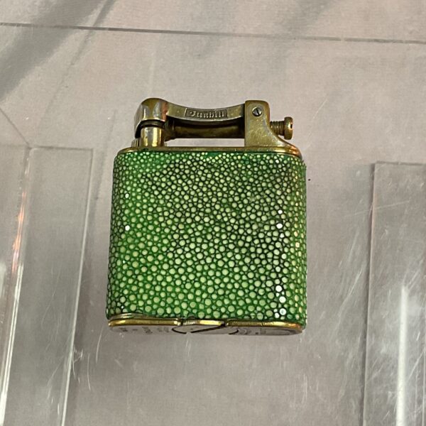 Vintage Dunhill shagreen lighter with green textured surface.