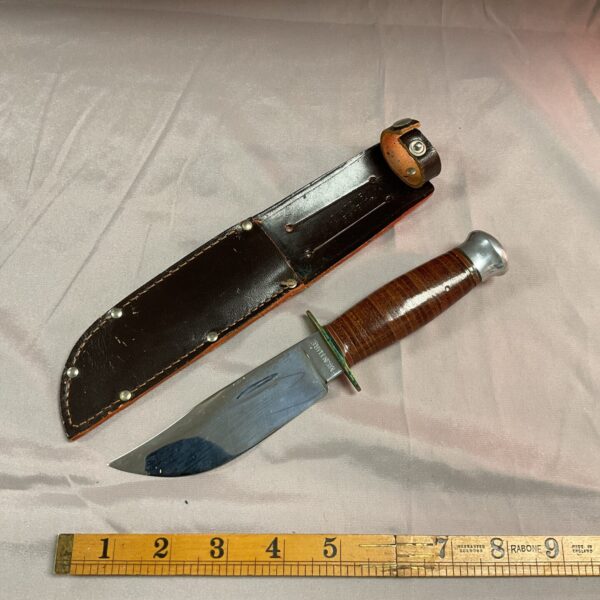 Vintage Sheffield Venture Scout knife with leather sheath.