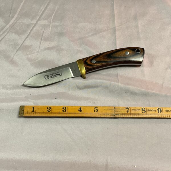 Vintage Stirling steel knife with stag handle, fixed blade.