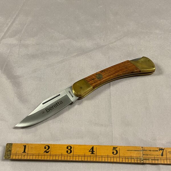 Vintage Beretta pocket knife with Falcon blades, a collectible Italian folding knife.