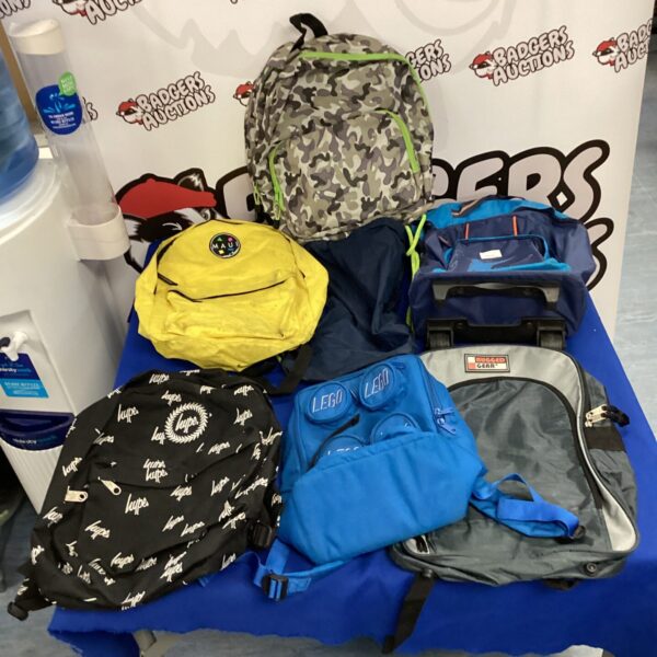 Mixed rucksack lot including Lego, Umbro and Hype backpacks.