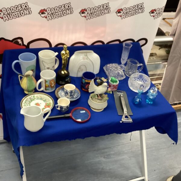 Mixed lot of vintage collectibles including blue glass and ceramics.