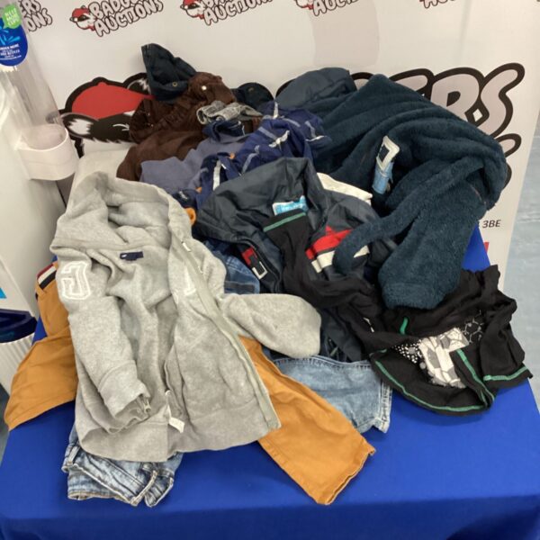 Mixed lot of childrens clothing including GAP and Trespass brands.