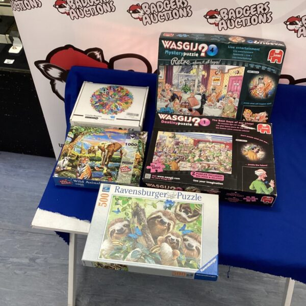 Lot of five jigsaw puzzles including a Wasjig puzzle.