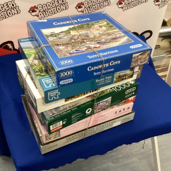 Lot of seven 1000-piece jigsaw puzzles by Terry Harrison.