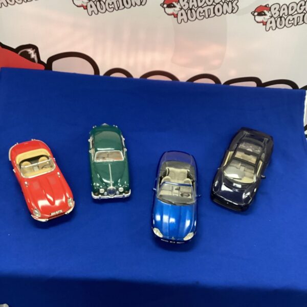 Diecast Jaguar car collection, Burago and Maisto 1/18 scale models.