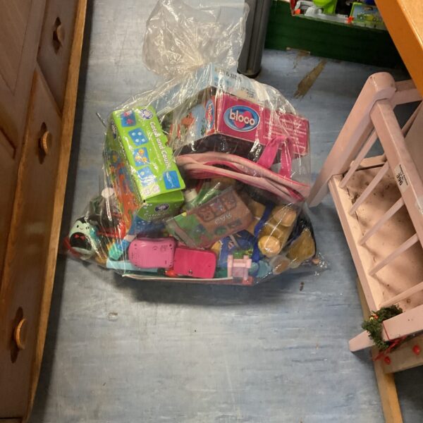 Assorted vintage and plastic toys in a mixed lot.