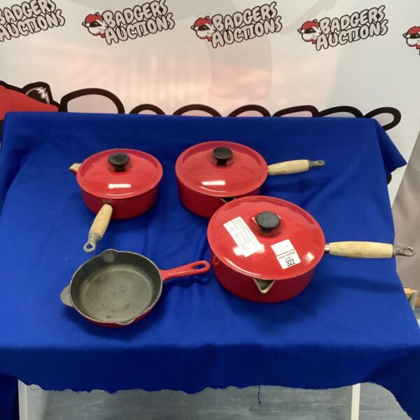 Red Le Creuset skillet and pan, vintage cast iron cookware.
