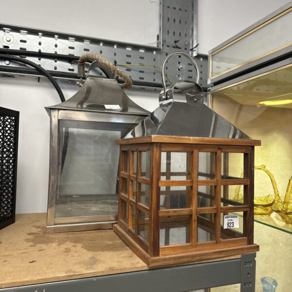 Vintage metal candle lantern with clear glass panels.