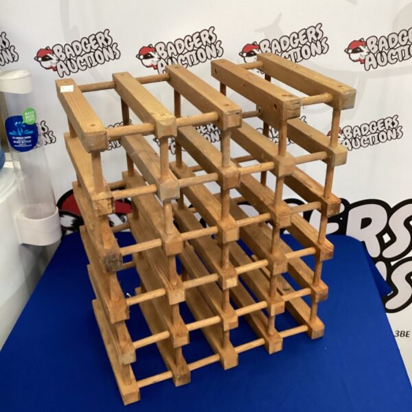 Wooden 20 bottle wine rack for home storage.