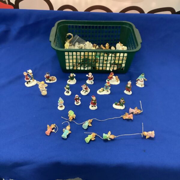 Vintage lot of miniature Christmas figurines for holiday decor.