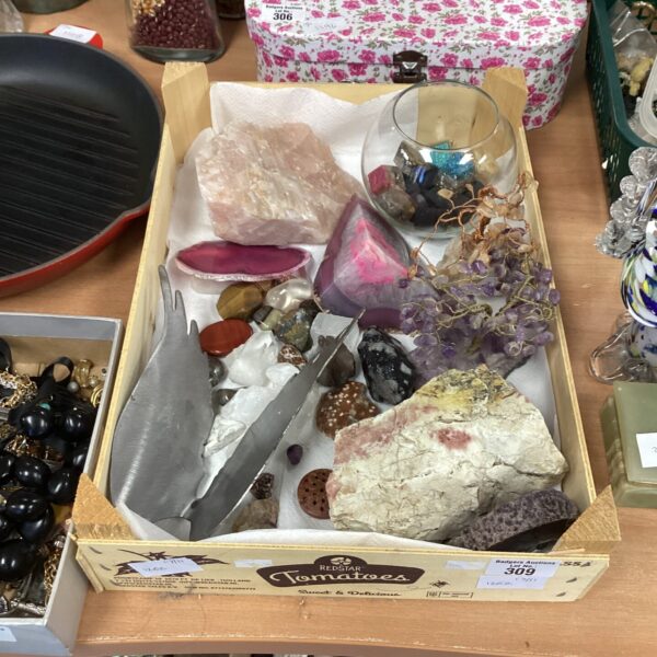 Diverse collection of semi-precious stones and mineral specimens.