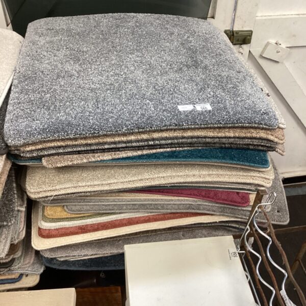 Diverse lot of carpet samples for flooring and interior design.