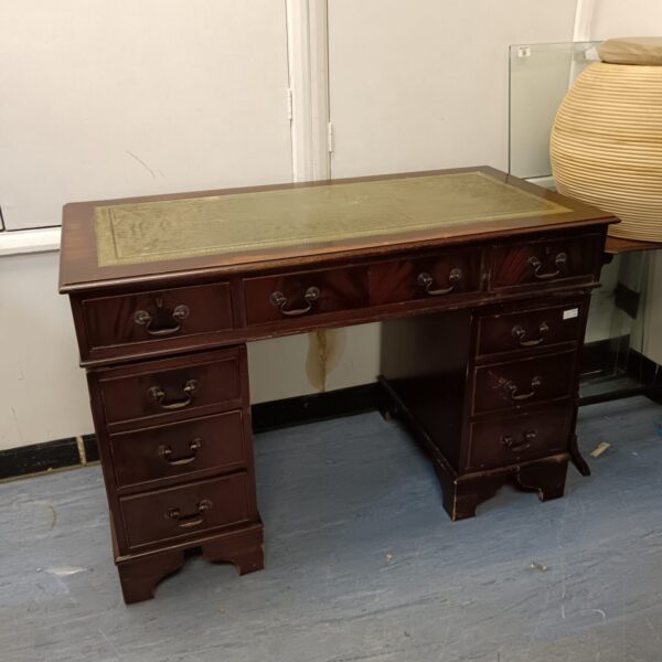 Antique mahogany pedestal desk with leather top