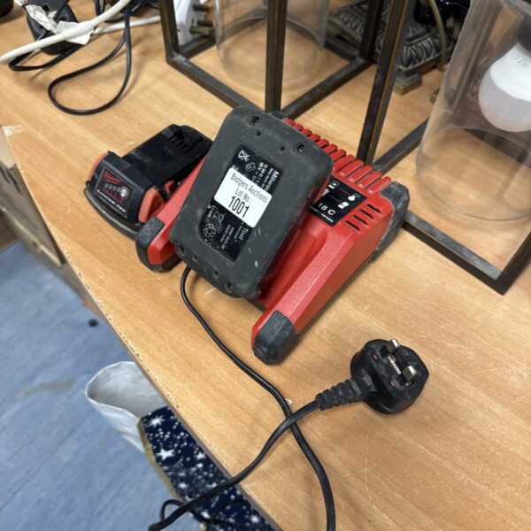 Untested Milwaukee battery charger for spares or repairs.