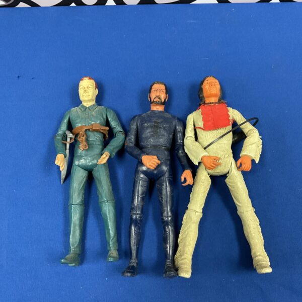 Vintage Johnny West action figure with rifle.