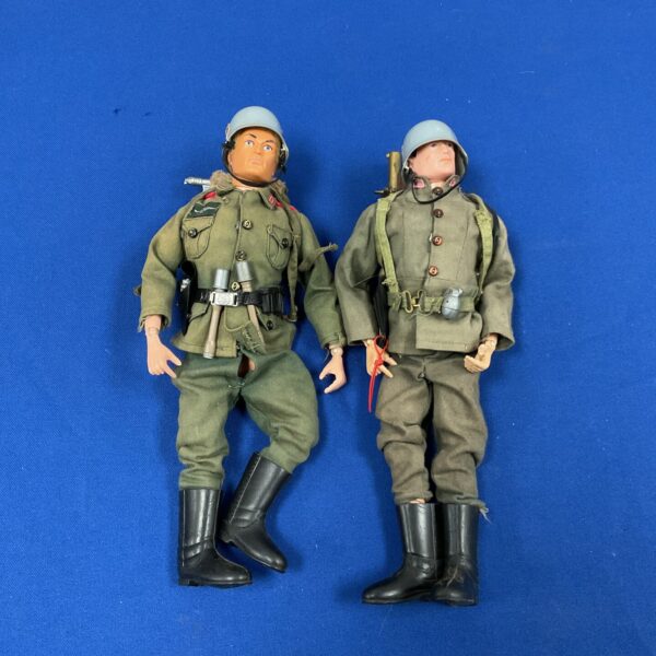 Vintage 1964 Palitoy Action Man figures in Nazi uniforms.